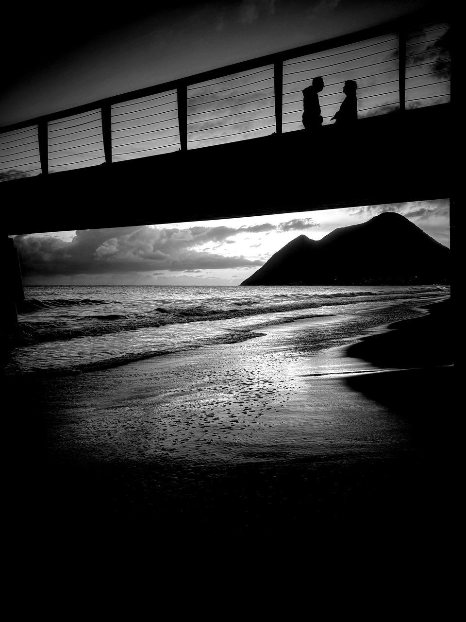 darkness, black, light, silhouette, water, reflection, white, black and white, monochrome, monochrome photography, sea, nature, architecture, men, sky, night, shadow, beach, built structure, outdoors, two people, lifestyles, land, adult, transportation, bridge, horizon, leisure activity, standing, motion