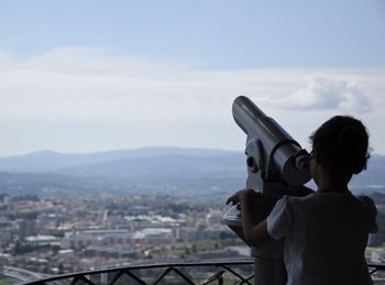 Woman photographing through smart phone