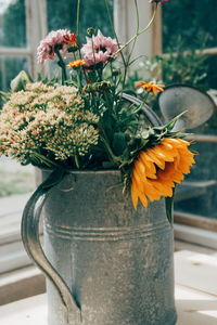 Close-up of flower pot on plant