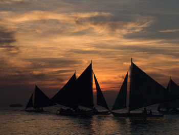 Sailboats at sunset in the philippines