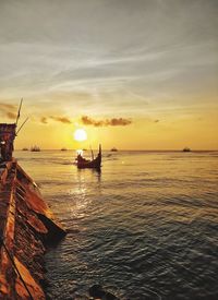 Scenic view of sea against sky during sunset