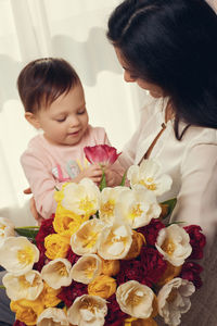 Close-up of girl with bouquet