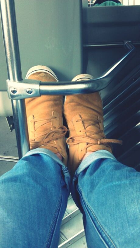 indoors, low section, blue, person, shoe, transportation, mode of transport, chair, personal perspective, seat, vehicle seat, footwear, day, vehicle interior, absence, sitting, metal, empty