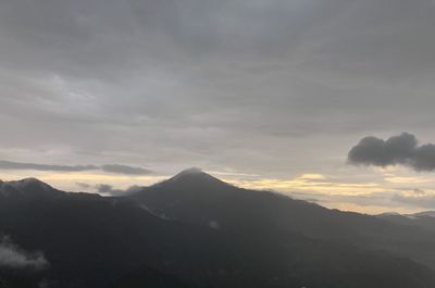 Scenic view of mountains against sky during sunset