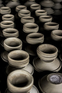 High angle view of various containers for sale at market stall