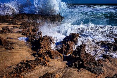 Waves splashing on rocks
