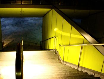 Illuminated staircase in sea