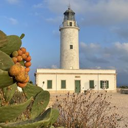 Low angle view of building against sky  - lighthouse formentera 