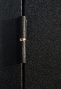 High angle view of pen on black background
