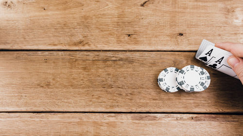 Directly above shot of dices on wooden table