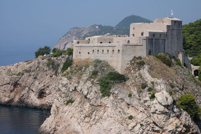 View of building with mountain in the background