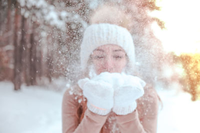 Full length of woman in snow