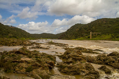 Scenic view of land against sky