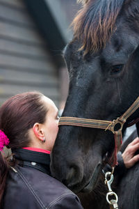 Close-up of boy with horse