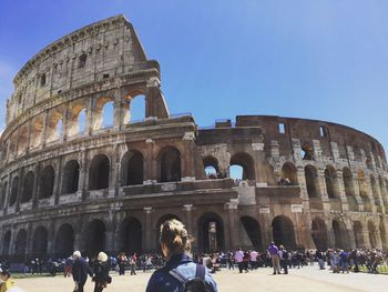 Tourists in front of coliseum