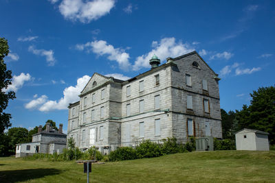 Low angle view of old building against sky