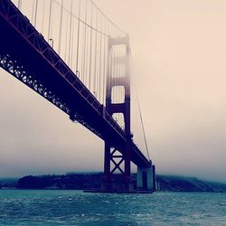 Suspension bridge over river