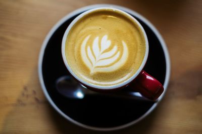 Close-up of coffee cup on table