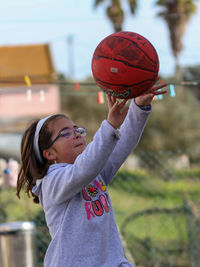 Young man playing basketball