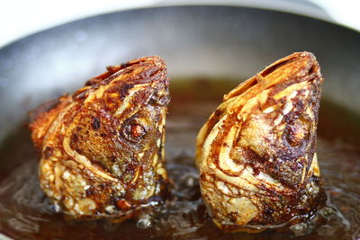 High angle view of meat on barbecue grill