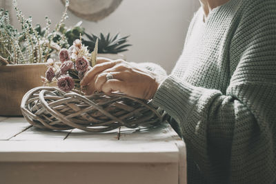 Midsection of woman holding gift box