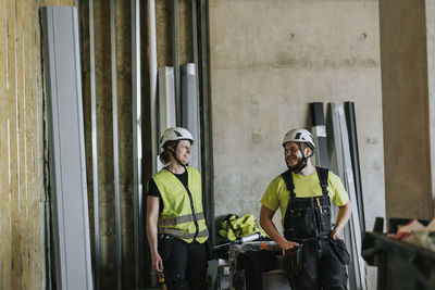 People talking at construction site