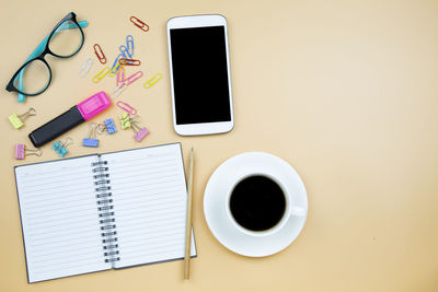 Directly above shot of coffee cup on table