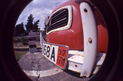 Cars on road against sky