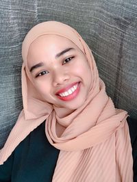 Portrait of a smiling young woman