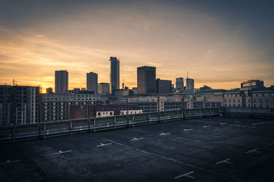 Cityscape against sky during sunset