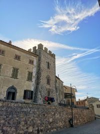 Low angle view of old building against sky