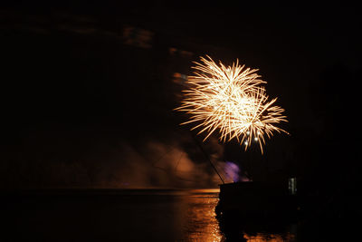 Firework display at night