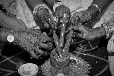High angle view of people on hands