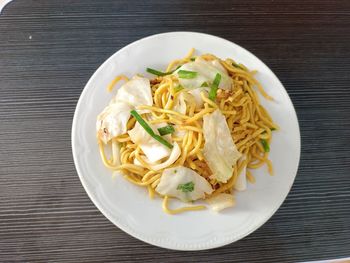 High angle view of pasta in plate on table