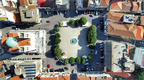 High angle view of street amidst buildings in city