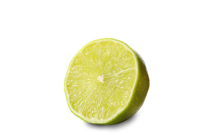 Close-up of lemon slice against white background