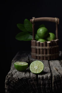 Close-up of green fruits on table