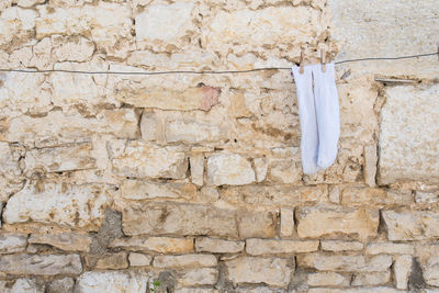 Low angle view of weathered wall