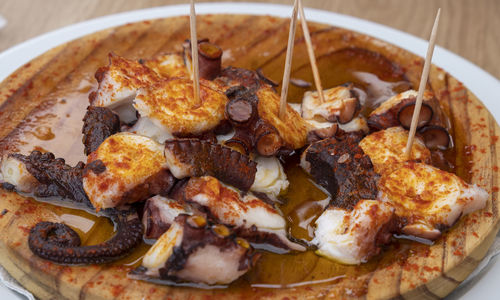 Ration of pulpo a feira, typical galician recipe for cooking octopus.