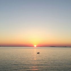Scenic view of sea at sunset