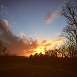 Empty road at sunset