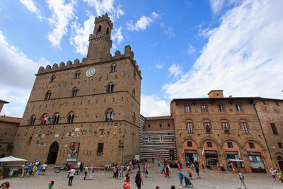 Tourists in front of historical building