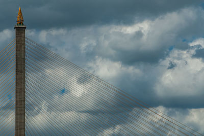 Low angle view of building against cloudy sky