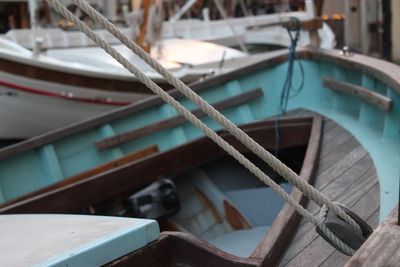 Boats moored at harbor