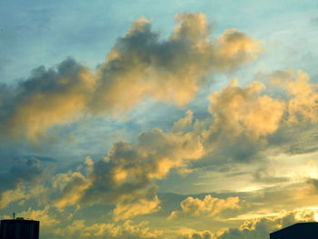 Low angle view of dramatic sky during sunset