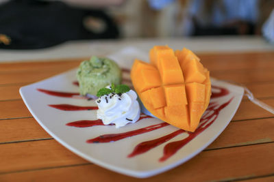 Close-up of dessert served on table