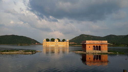 Scenic view of jal mahal palace reflected in water