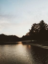 Scenic view of lake against sky during sunset
