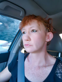 Portrait of woman in car