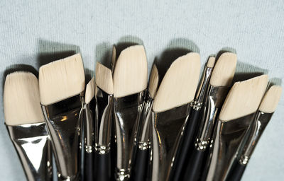 Close-up of paintbrushes on table